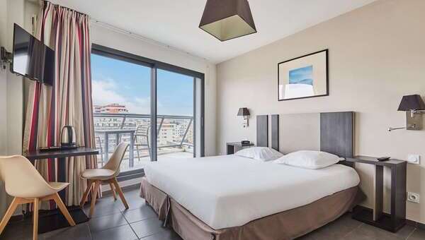 Lit dans un appart'hôtel
