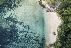 Club Med Océan Indien & Asie Vue aérienne d'une plage avec eau turquoise